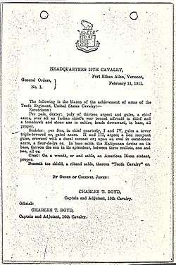 A black and white copy of "General Orders No. 1" that describes the 10th US Cavalry Regimental Coat of Arms in 1911.