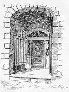 Black and white drawing of an engraved door recessed several feet into a stone archway
