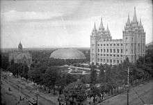 Photograph of Temple Square in 1897, showing the Assembly Hall, the Tabernacle, and the Salt Lake Temple.