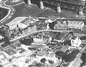 Aerial view of the Jeffrey Street area showing cottages, terraces and part of the Sydney Harbour Bridge