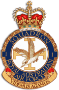 Crest of 1 Squadron, Royal Australian Air Force, featuring a diving kookaburra before the Jerusalem cross, and the motto "Videmus Agamus"