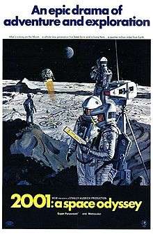 A painted image of four space-suited astronauts standing next to a piece of equipment atop a Lunar hill, in the distance is a Lunar base and a ball-shaped spacecraft descending toward it—with the earth hanging in a black sky in the background. Above the image appears "An epic drama of adventure and exploration" in blue block letters against a white background. Below the image in a black band, the title "2001: a space odyssey" appears in yellow block letters.