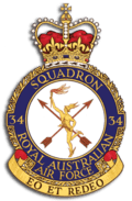 Crest of 34 Squadron, Royal Australian Air Force, featuring winged messenger in gold, two crossed arrows, and the motto "Eo et redeo"