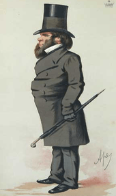 Squat, heavily bearded and smartly dressed man in a suit and very large top hat