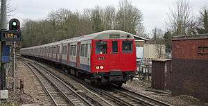 Amersham (local) bound Metropolitan line train approaching Chorleywood, Hertfordshire.