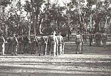 A formation of soldiers performing drill.