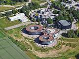 Aerial view of large, landscaped complex of ESO's headquarter buildings in Garching, Germany