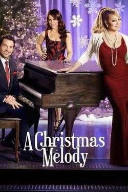 Mariah Carey, Lacey Chalbert (in the middle) and Richard Marx around a piano