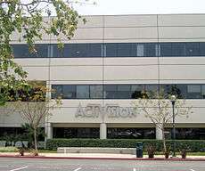 A grey nondescript building with the text "Activision" on the first floor.