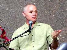 A photo of Adyashanti at a public event in April 2013.