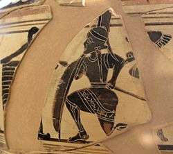 More pottery fragments. An armoured man kneels, hiding behind the structure.