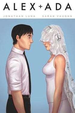 Alex and his new android face each other in a pose similar to a bride and groom during a wedding