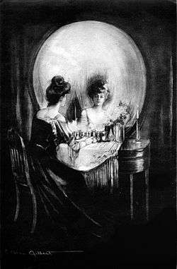 lady at round mirror and dressing table resembling a skull "All is Vanity" by C. Allan Gilbert