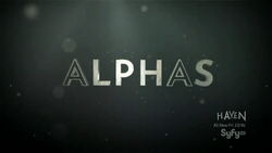 ALPHAS written in white against a grey-green background, the letters A are written as an outline