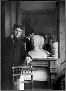 Amadeo de Souza-Cardoso in front of a mirror reflecting his friend Emérico Nunes in the appartement he had on the Boulevard du Montparnasse