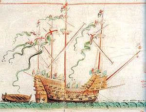 A colorful illustration shows a highly ornamented ship with four masts and bristling with guns sailing over a mild swell towards the right of the picture, towing a small boat