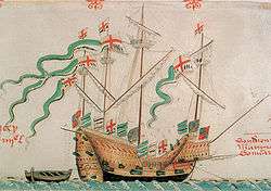 A sailing vessel with square flags along its railing: the designs include horizontal green and white stripes, the cross of Saint George, three fleurs-de-lys on a blue background and the blue, red and gold English royal arms.