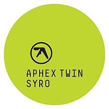 The words "Aphex Twin Syro" written in uppercase black monospace text inside a lime green circle.