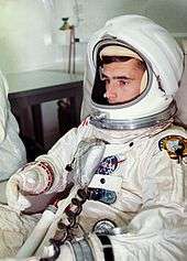 Roger Chaffee seated in his Apollo 1 space suit before a spacecraft test