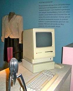 A Macintosh sits in a museum exhibit about postmodernism.