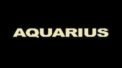Aquarius written in white block letters on a black background