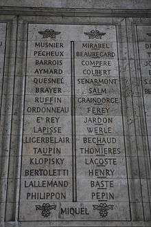 Photo of two stone panels with lists of surnames from the Arc of Triomphe.