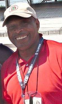 A picture of Archie Griffin on a phone.