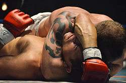 Arm triangle choke from the side control position