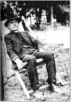 Black and white photograph of Arthur Corlette seated.