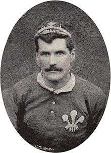 Upper body shot of Gould wearing his Wales cap and jersey