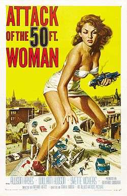 Poster art. A giant woman clad in a white bikini straddles an elevated, 4-lane highway. She has an angry expression, and she's holding one smoking car in her left hand as if it were a toy. She is reaching down to grab another. There are several car crashes on the highway, and people are fleeing from her as if they were small insects.