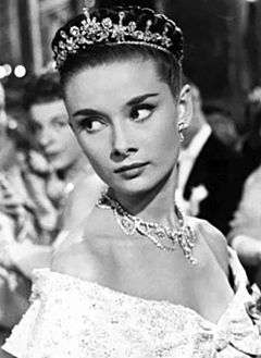 A photograph of Hepburn as Princess Ann in the film Roman Holiday.