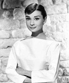 Black-and-white photo of Audrey Hepburn from 1956.