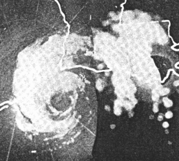 A black and white radar image of a hurricane. A definitive eye is clearly seen.