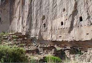 A Remains of multistory dwelling built into volcanic tuff wall. Bandelier National Monument, New Mexico