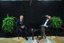 United States President Barack Obama being interviewed by Zach Galifianakis for "Between Two Ferns with Zach Galifianakis," in the Diplomatic Reception Room of the White House on 24 February 2014.