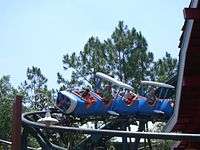 One of the Barnstormer's trains going through a turn.