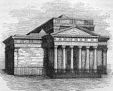 A etching of an early large Victorian building with six columns in a large porch