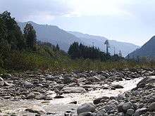 A photograph of beas river and mountains in manali