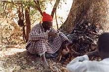 Famous Bedik diviner just outside Iwol, southeast Senegal (West Africa) He predicted outcomes by examining the color of the organs of sacrificed chickens.