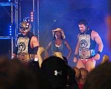 Beer Money, Inc. (James Storm, Robert Roode, and Jacqueline]] during her ring entrance at Bound for Glory IV