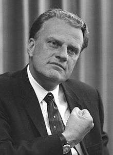 A black-and-white image of Billy Graham