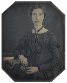 Photograph of Emily Dickinson, seated, at the age of 16