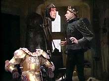 Prince Edmund (Rowan Atkinson) is haunted by the headless ghost of Richard III (Peter Cook)