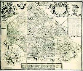 Drawing of the layout of a city, showing medieval walls and a star fortress.