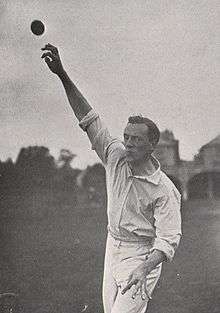 A cricketer about to bowl.