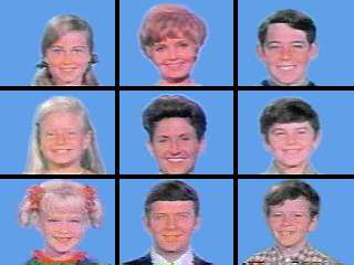 A 3 × 3 grid of squares with face shots of all nine starring characters of the television series: three blond girls in the left three squares, three brown-haired boys in the right three squares, and the middle three squares feature a blond, motherly woman, a dark-haired woman, and a brown-haired man; all the faces are on blue backgrounds.