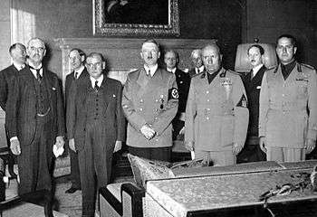 group portrait Edward Chamberlain, Édouard Daladier, Adolf Hitler, Mussolini, and Count Ciano, as they prepared to sign the Munich AgreementChamberlain, Daladier, Hitler, Mussolini, and Italian Foreign Minister Count Ciano, as they prepared to sign the Munich Agreement