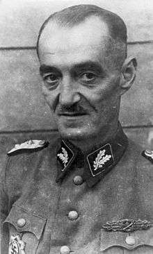 a black and white photograph of Oskar Dirlewanger in Waffen-SS uniform