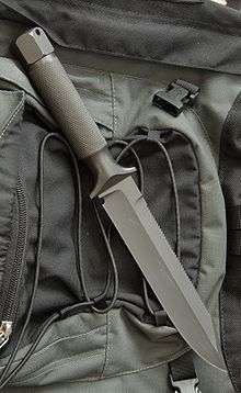 Knife on green backpack